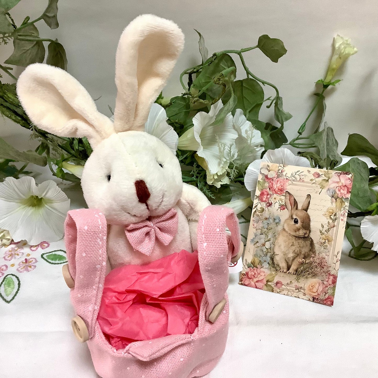 Lapin blanc peluche avec sac rose pois