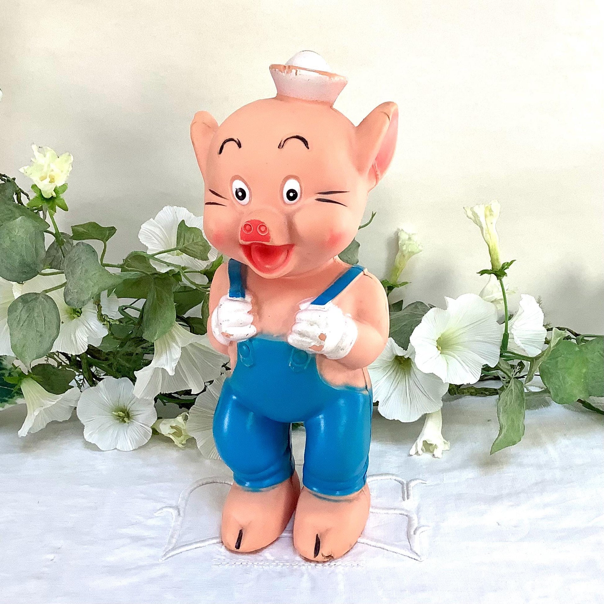 Vue rapprochée jouet couineur Naf Naf Disney trois petits cochons caoutchouc, vintage 25 cm