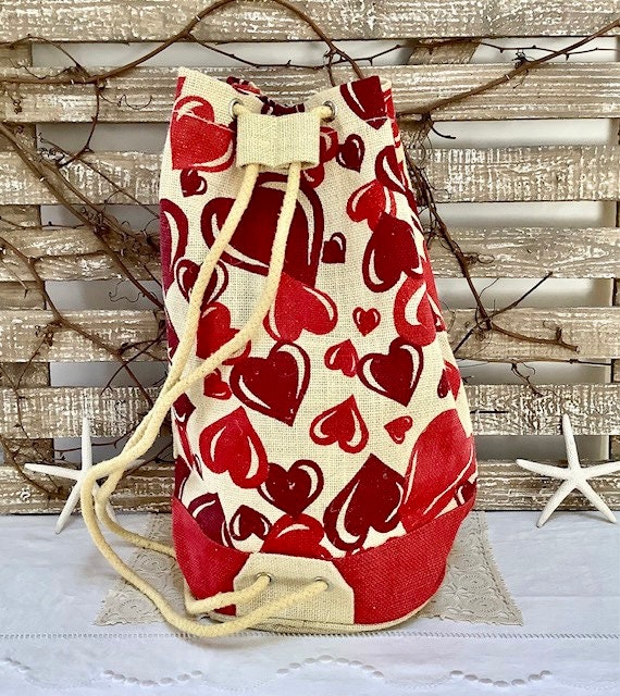 Sac de plage imperméable toile de jute beige coeur rouge ht 40 cm