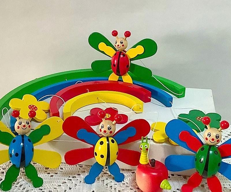 Jeu mobile bois coccinelles et fleurs ht 37 cm