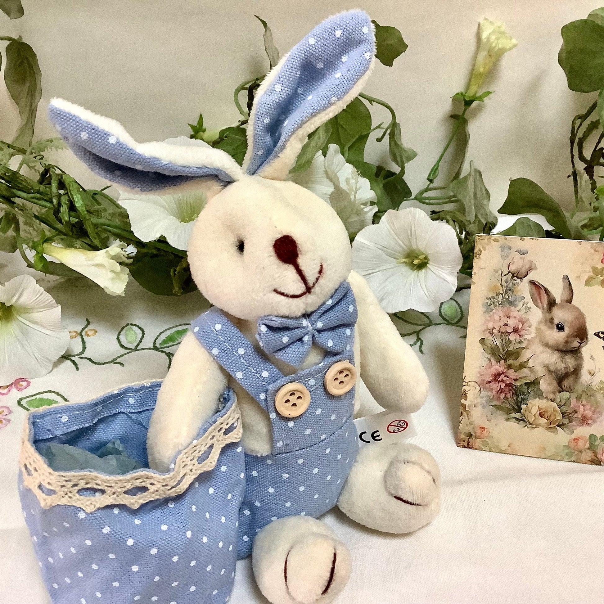 Lapin blanc peluche sac bleu pois décoration pâques 