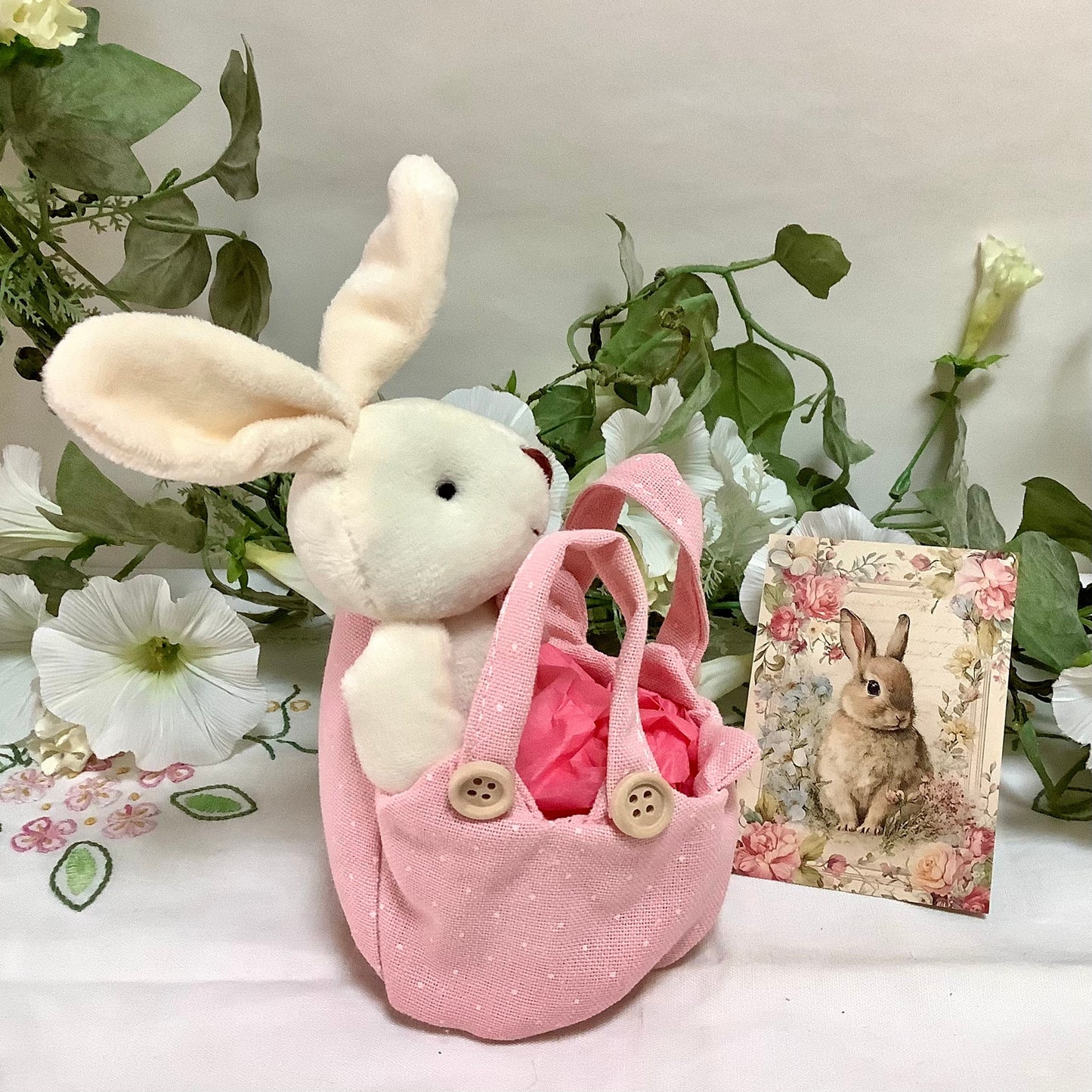 Lapin blanc peluche avec sac rose pois