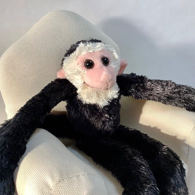 Peluche singe noir et blanc wild republic