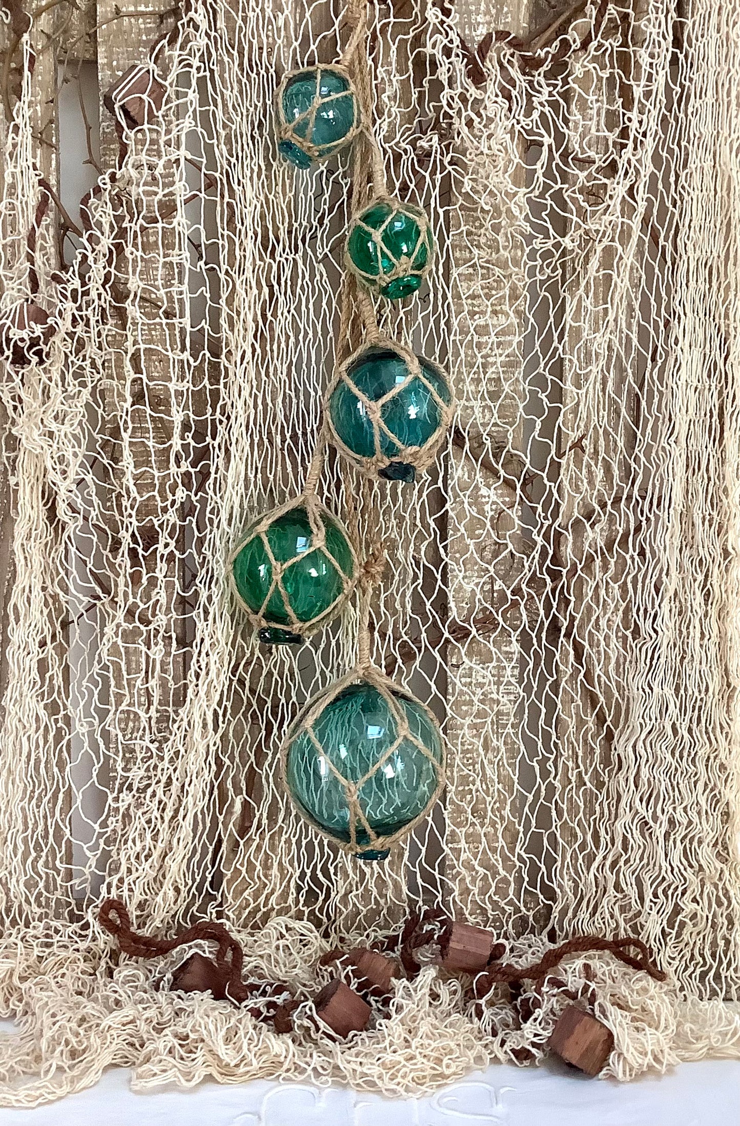 Guirlande de boules de casier verre bleu vert décoration marine ht 65 cm