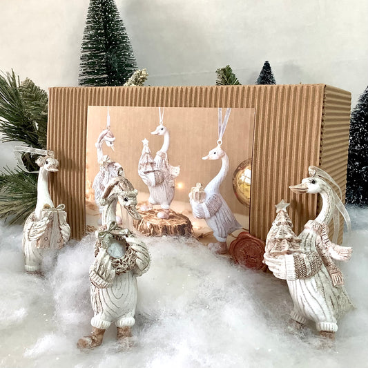Figurines oies beige décoration de Noël résine ht 10.5 cm