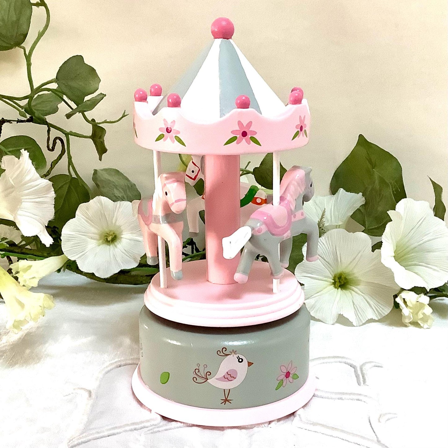 Boîte à musique bois rose manège chevaux