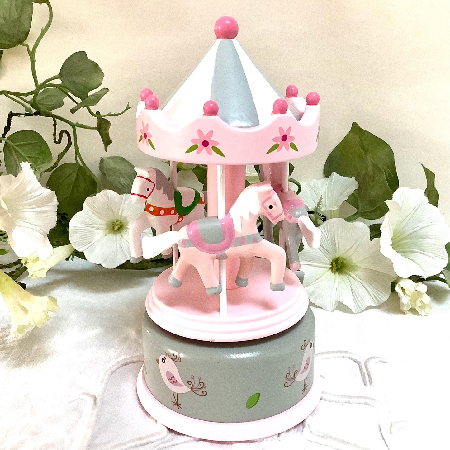 Boîte à musique bois rose manège chevaux