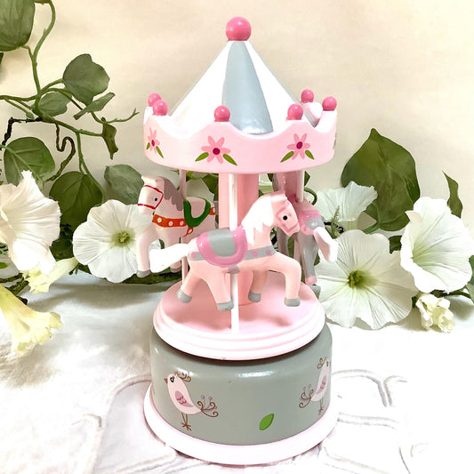Boîte à musique bois rose manège chevaux