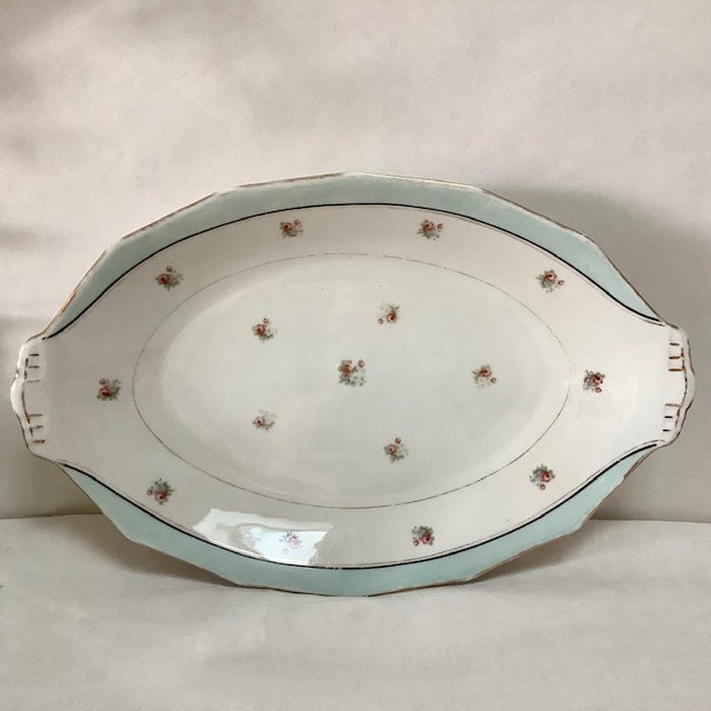 Grand plat ovale porcelaine Limoges France vintage