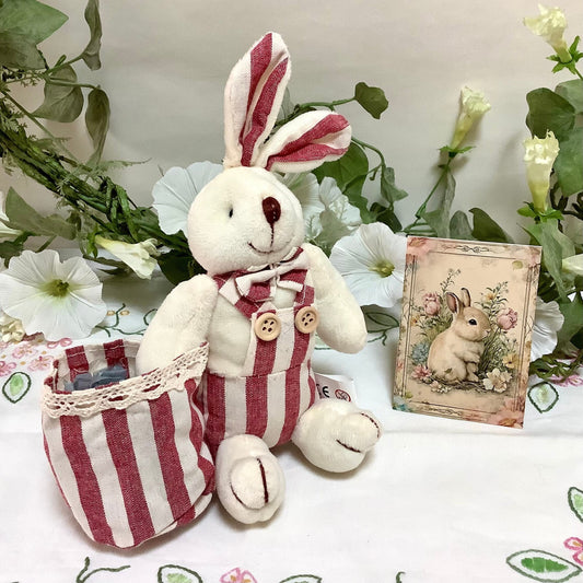 Lapin blanc peluche sac rayures décoration pâques 