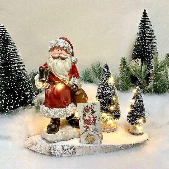 Composition de Noël lumineuse Père Noël cadeau ht 24.5 cm