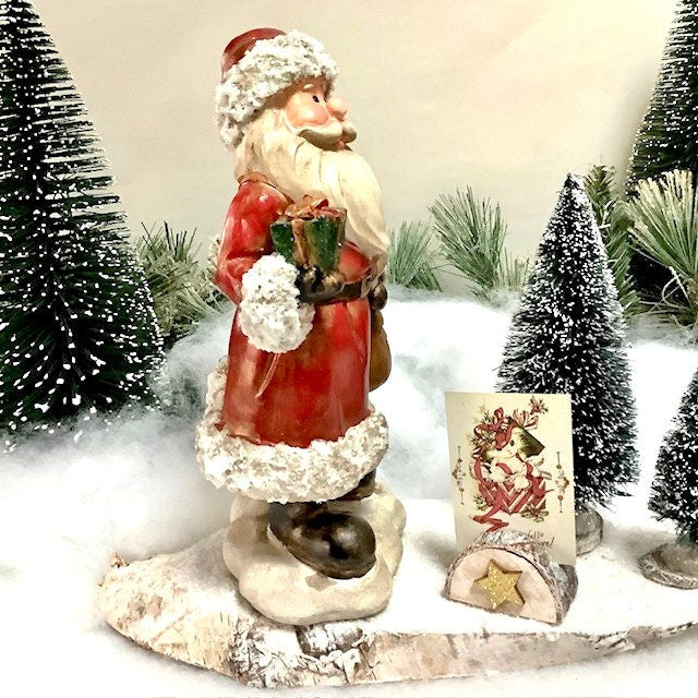 Composition de Noël lumineuse Père Noël cadeau ht 24.5 cm