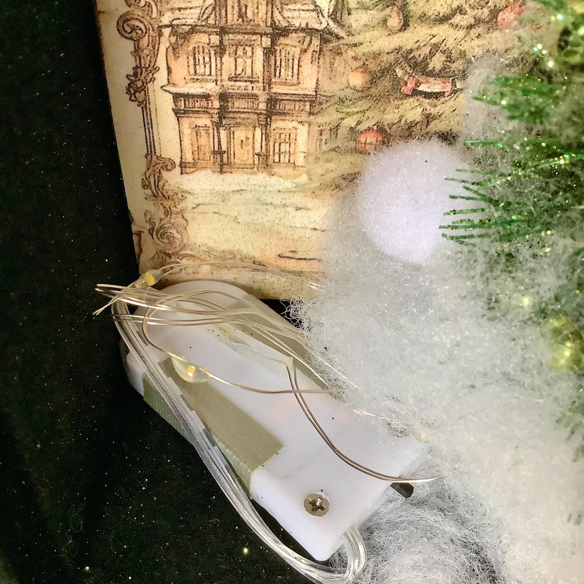 Décoration lumineuse dans livre bois scène de Noël vintage ht 17 cm