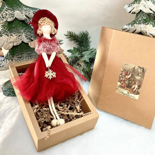 Poupée ange à suspendre rouge flocon