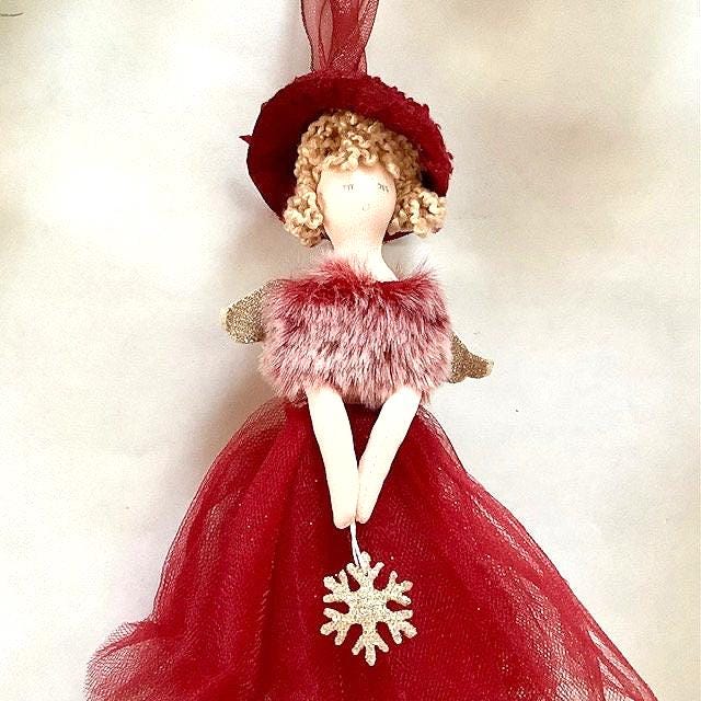 Poupée ange à suspendre rouge flocon