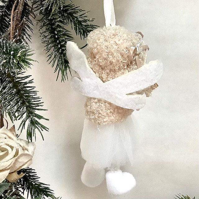 Poupée ange à suspendre beige flocon