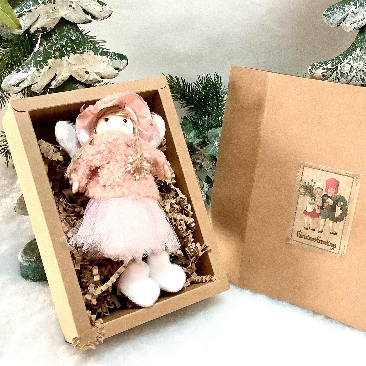 Poupée ange à suspendre rose flocon